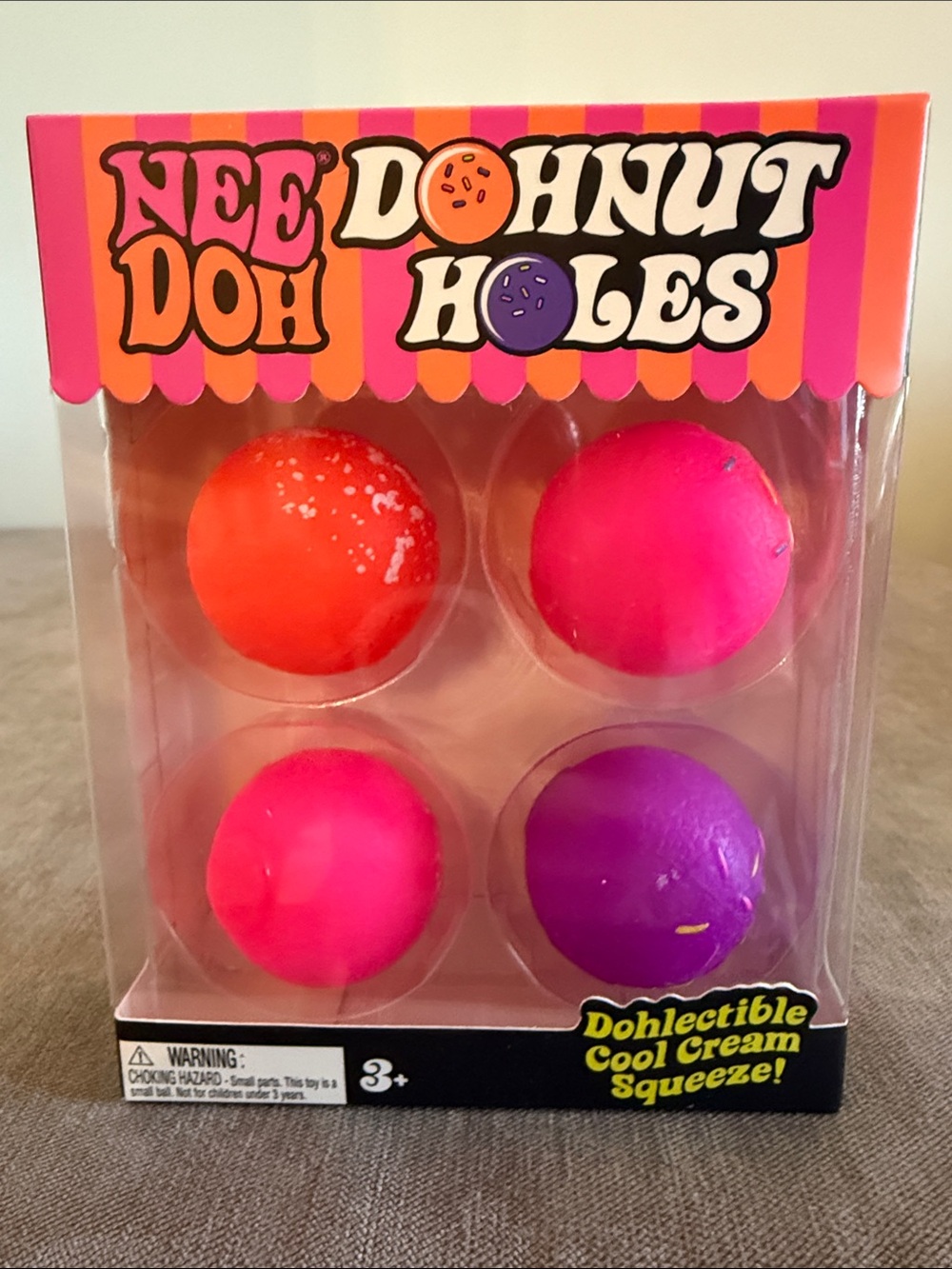 NeeDoh Dohnut Holes Squishy Four Pack | Bright Pink, Orange & Purple | NEW